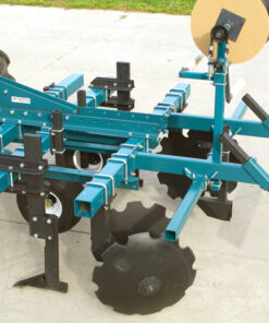 Triple bar bedder with subsurface driptape applicator, vertical chisels
