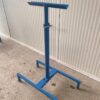 A Roller Conveyor 8'x15" is sitting on a concrete floor.