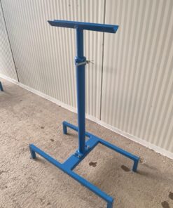 A Roller Conveyor 8'x15" is sitting on a concrete floor.